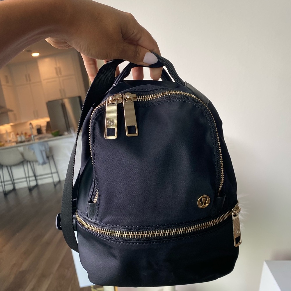 lululemon athletica Black Mini Crossbody Backpack with Gold Hardware